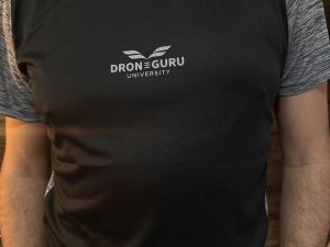 Camiseta deportiva "Drone Gurú University"